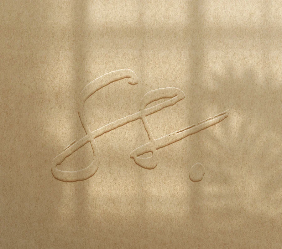 Embossage du logo Monogramme de la Maison Osso sur papier naturel